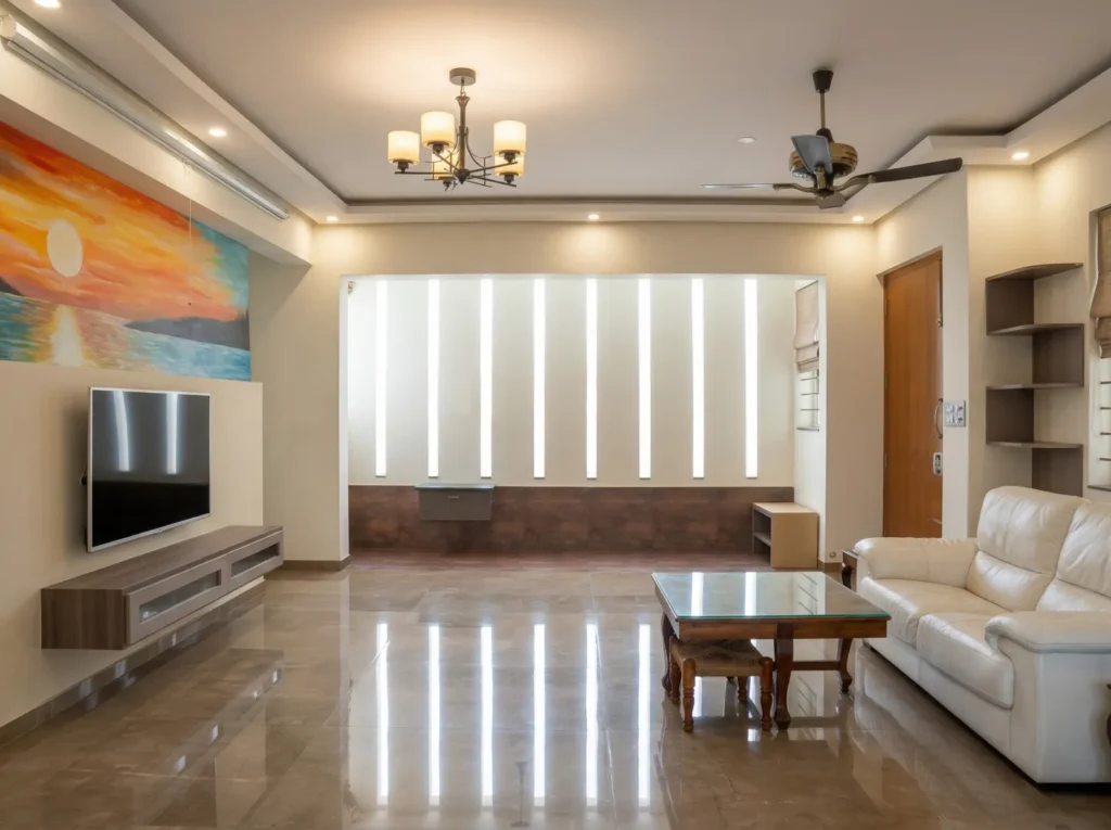 Spacious residential living room with backlit panel wall, marble flooring, and wall mural — interiors and construction in Bangalore.