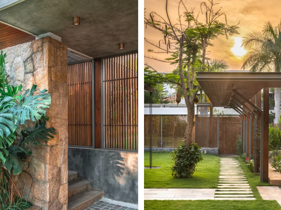 Residential entry porch with rough granite stone column, teak louvre screen, and garden pergola pathway at sunset in a Bangalore home construction by High Tech Constructions